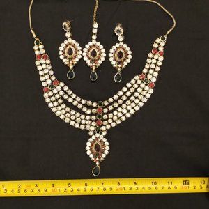 Gold, red green Indian Jewelry necklace, earrings and headpiece set